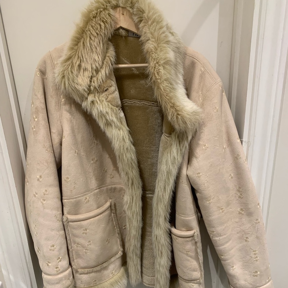 Lintor Petite fur beige trim coat, flower imprint on body of coat.